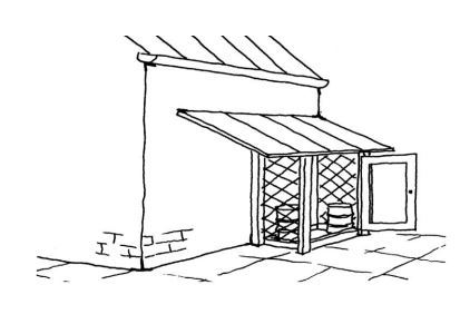 Overdækket plads med opkant, som er afskærmet mod nedbør.